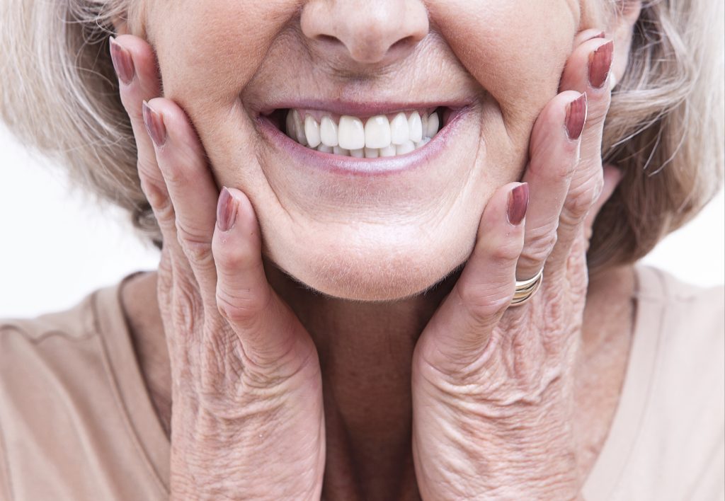 a senior woman smiling