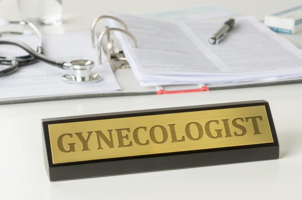 Name plate on a desk with the engraving Gynecologist