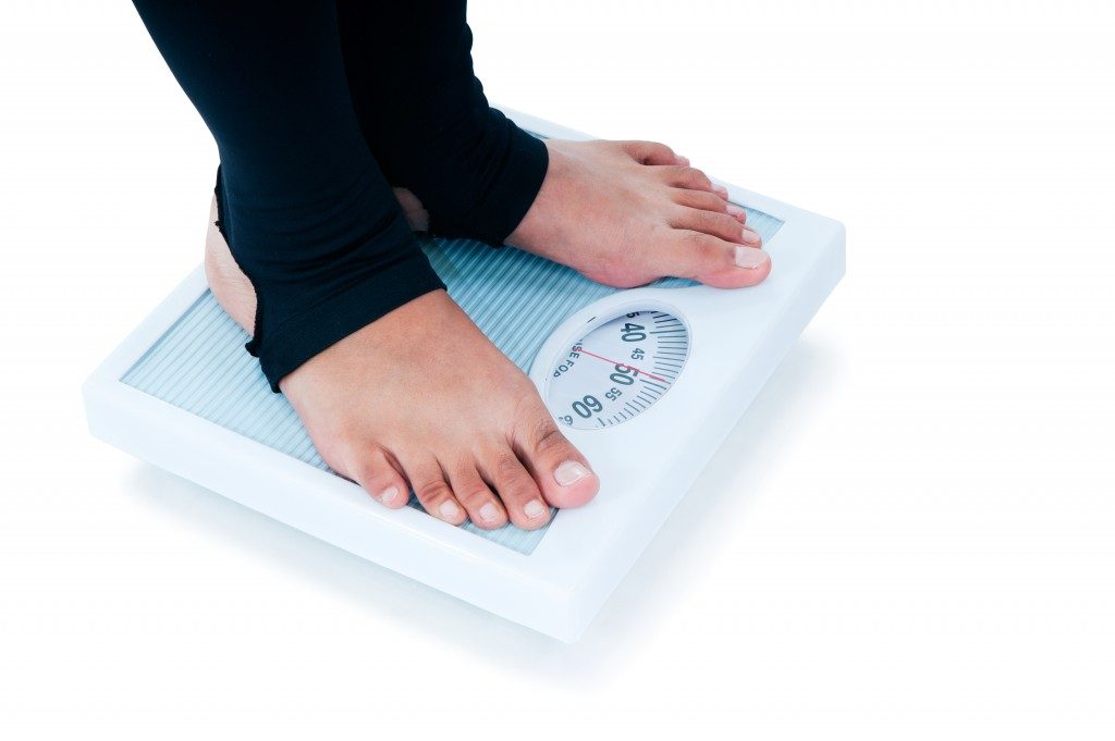 weighing scale being used