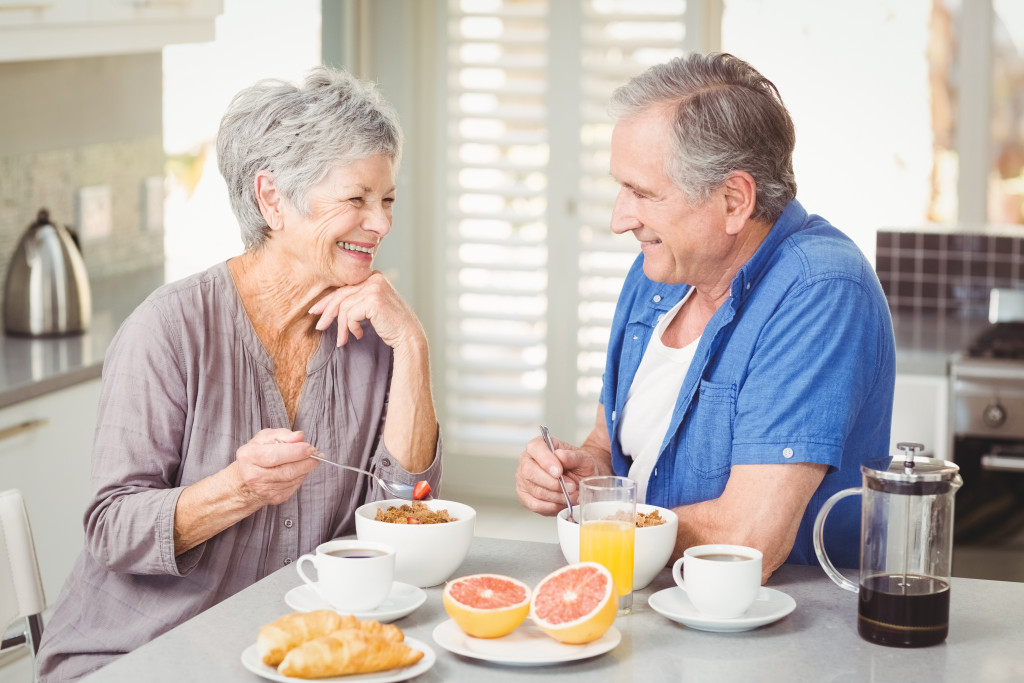 an old couple having breakfast