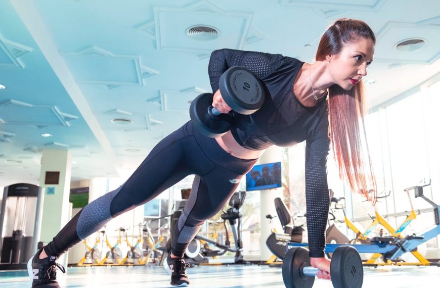 Woman Doing Exercise Inside Gym